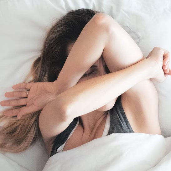 If You're Feeling Exhausted During Ovulation, Here's What's Really Happening